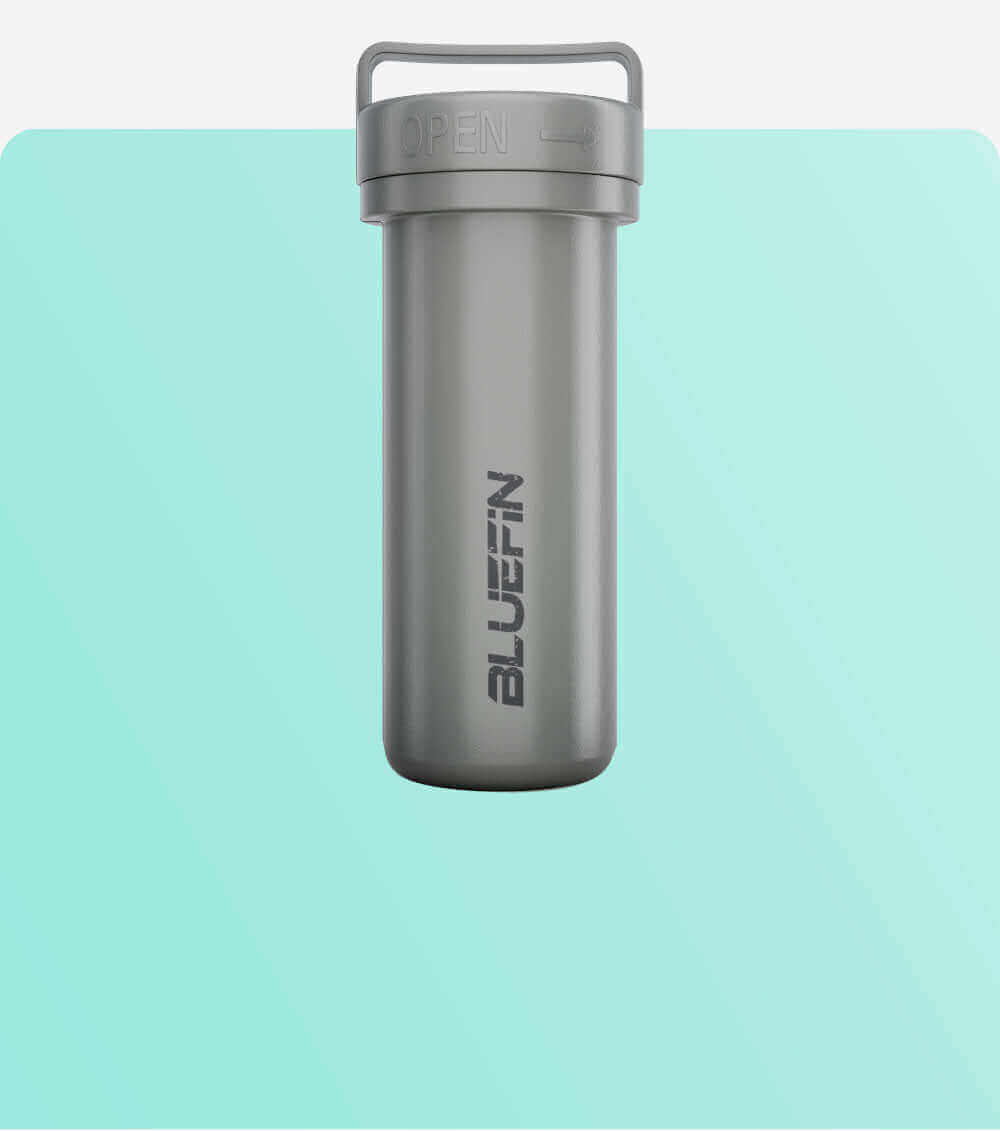 Gray waterproof container with an open lid and the word BLUEFIN printed on the side
