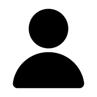 Black silhouette of a person with a circular head and rounded shoulders