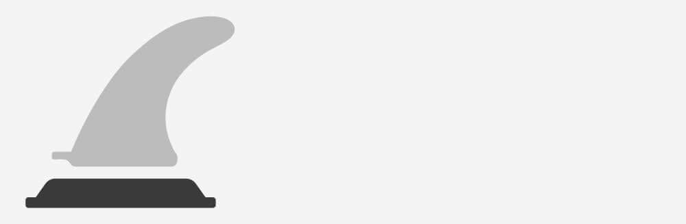 Gray surfboard fin mounted on a black base against a light background