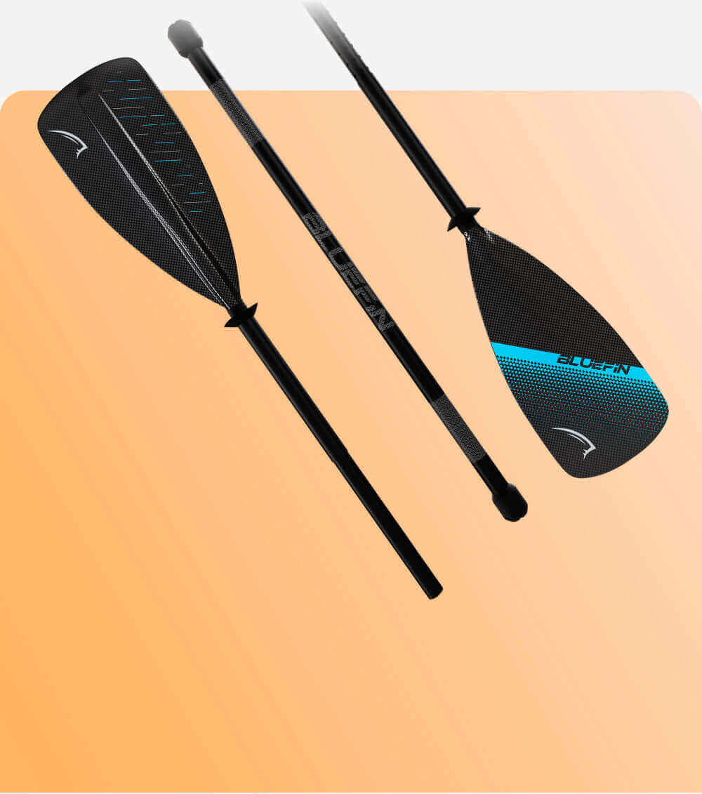 Black paddle with textured blade, blue accents, and adjustable shaft on an orange background