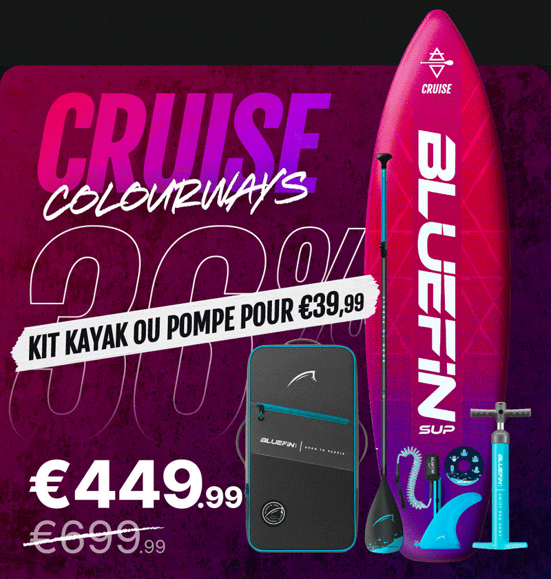 Inflatable paddleboard in pink and purple with paddle, pump, and carrying bag displayed on a dark background