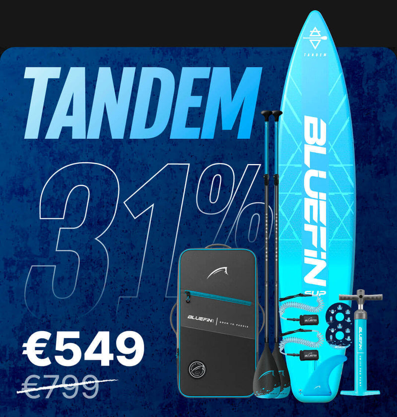 Inflatable tandem paddleboard in blue with paddles, pump, and carrying bag, showing price and discount.