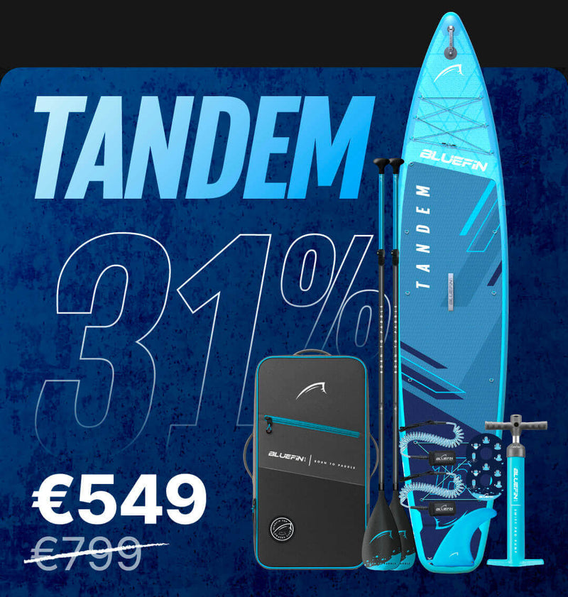 Inflatable tandem paddleboard in blue with paddles, pump, and carrying bag, priced at €549