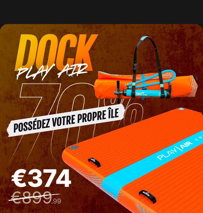 Orange inflatable paddleboard with textured surface and blue accents, featuring a carrying strap and price tag.